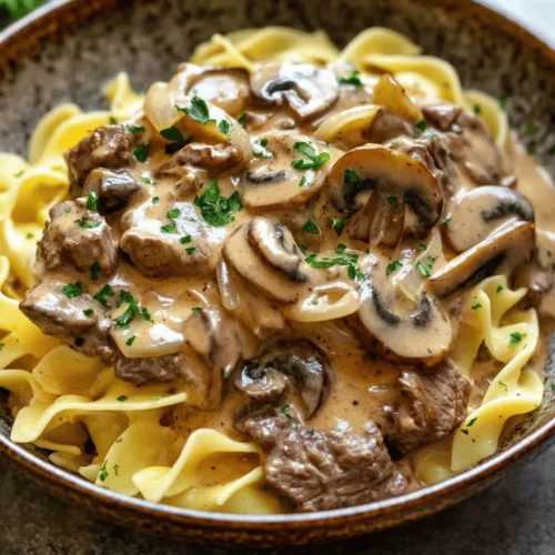 In the world of comfort food, few dishes can rival the rich, creamy goodness of Beef Stroganoff. This classic recipe has stood the test of time, evolving from its Russian origins into a beloved household favorite in many cultures. Traditionally, Beef Stroganoff is known for its tender strips of beef cooked in a savory sauce, typically made with sour cream and mustard, and served over egg noodles or rice. However, today we’re giving it a modern twist with the addition of Velveeta cheese, which elevates the dish to a new level of creaminess and indulgence.