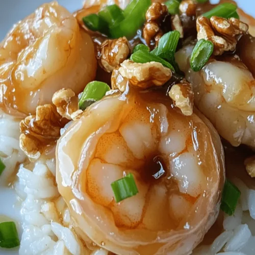 Honey Walnut Shrimp is a beloved dish that has gained immense popularity in Chinese cuisine, especially within the realm of Chinese-American dining. This dish beautifully marries the delicate sweetness of honey with the crunch of walnuts and the tender succulence of shrimp, creating a flavor profile that is both intriguing and satisfying. Often served as a main course or at special occasions, Honey Walnut Shrimp appeals to a wide range of palates, making it a favorite among diners of all ages.