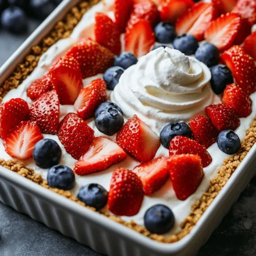 As summer approaches, many of us start looking for ways to celebrate the season with delicious and festive desserts. One standout option is the No-Bake Cheesecake Flag Bars, a strikingly beautiful and delicious treat that pays homage to the American flag. These bars not only look impressive but also capture the creamy, indulgent flavor of traditional cheesecake without the need for an oven. Perfect for patriotic occasions such as Independence Day, Memorial Day, or any gathering where you want to add a touch of festivity, these cheesecake bars are sure to be a hit.