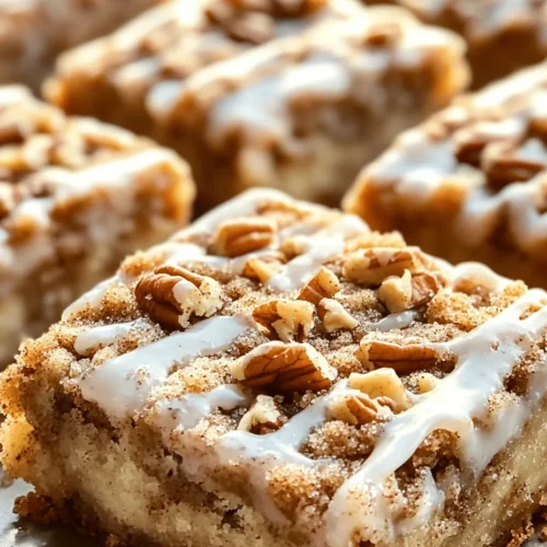 If you’ve ever found yourself torn between the gooey, comforting embrace of cinnamon rolls and the rich, buttery decadence of blondies, then you’re in for a treat. Cinnamon Roll Blondies are a delightful fusion of these two beloved desserts, combining the warm, spiced flavor of cinnamon rolls with the chewy, melt-in-your-mouth texture of blondies. This innovative dessert not only marries the best of both worlds but also offers an incredibly easy preparation method that even novice bakers can master.