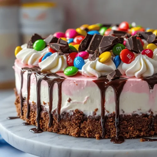 If you're on the hunt for a dessert that embodies indulgence while being incredibly easy to prepare, look no further than the Pink Paradise No-Bake M&M Snickers Cheesecake. This vibrant cheesecake combines the rich flavors of cream cheese and chocolate with the crunch of Snickers bars and the colorful pop of M&M's, creating a dessert that's as delightful to look at as it is to eat. Perfect for any occasion, whether it's a birthday celebration, a summer barbecue, or simply a sweet treat for yourself, this cheesecake is sure to impress.