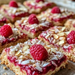 Dessert bars have become a staple in the culinary world, renowned for their convenience and mouthwatering flavors. These delightful treats, often easy to prepare and share, have a special place in the hearts of dessert enthusiasts. Among the myriad of options available, Raspberry Coconut Bars stand out as a unique combination that brings together the sweet tang of ripe raspberries and the rich, creamy essence of coconut. This enticing pairing creates a dessert that is not only delicious but also offers a tropical twist that transports you to a sun-kissed paradise with every bite.